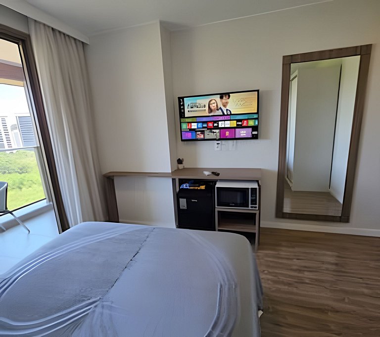 Suíte na Barra Garagem Micro-ondas e TV 42" 102BL2