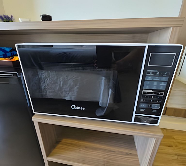 Suíte na Barra Garagem Micro-ondas e TV 42" 102BL2