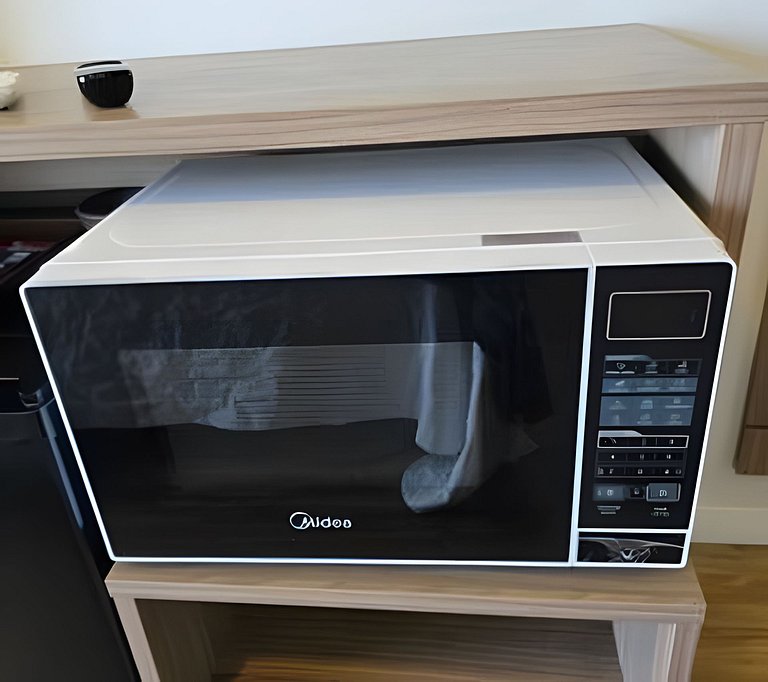 Suíte na Barra Garagem Micro-ondas e TV 42" 102BL2