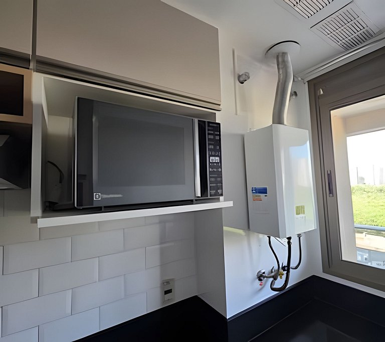 Apto na Barra com Cozinha, Garagem e TV 50" 5BL2